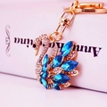 Elegant swan keychain with deep blue marquise crystals and white rhinestones on gold alloy - Blue