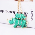 Green enamel rhinoceros keychain with sparkling rhinestones and golden metal trim - Green