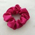 Detailed close-up of fuchsia satin scrunchie showing soft fabric texture and glossy finish - Rose Red