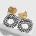 Detailed close-up of golden metal studs with woven faceted silver-grey bead hoops - erp46 Silver