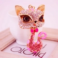 Goldener Katzen-Schlüsselanhänger mit rosa Emaille und funkelnden Strasssteinen - Rosa