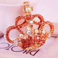 Portachiavi a corona in oro rosa scintillante con strass rosa e design traforato unico - Pesca