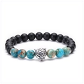 Close-up of 8mm matte black onyx beads with turquoise jasper and silver leopard head charm - Leopard - Antique Silver