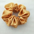 Luxurious golden satin scrunchie with smooth silk texture and elegant pleated design - Gold Brown