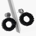 Detailed shot of black woven crystal beads hoop earrings with sparkling silver diamond accents - erp45 Black