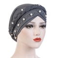 Close-up of dark grey turban featuring woven cross design and elegant white pearls - Gray