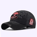 Detail of 3D New York embroidery and Statue of Liberty patch on washed cotton cap - Black