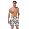 Men's quick-dry swim trunks with white base and pink floral palm leaf tropical print - Bird of Paradise