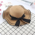 Cappello di paglia con tesa ondulata e fiocco in nastro nero finitura beige naturale - M (56-58cm) / Cachi