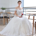Off-shoulder white wedding dress with floral lace embroidery and voluminous tulle skirt - US 26W / Floor Length