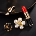 Chic 4-piece brooch set featuring high heel, lipstick, pearl flower, and geometric designs - Lipstick
