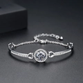 Elegante bracciale d'argento con zircone rotondo micro-pavé e catenina regolabile - Stile Zirconia Rotonda (B19022001)
