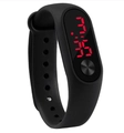 Detail view of the black silicone LED sports watch with red digital display and metal button - Black