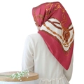 Detail of burgundy silk square scarf with gold chains and horsebit equestrian pattern - Rose Red