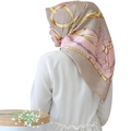 Detail of pink and beige satin scarf featuring vintage golden chain and buckle patterns - Light Pink