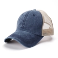 Close-up of blue washed cotton baseball cap with beige mesh back and curved brim - Adjustable / Denim Blue