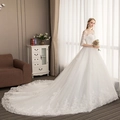 Elegant white lace ball gown wedding dress with off-shoulder neckline and luxury long train - US 26W / Trailing