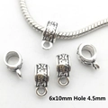 Macro detail of 6x10mm silver antique bail with 4.5mm hole for DIY jewelry making - 8912-Silver Relief Pattern