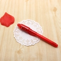 Multifunctional red UV invisible ink magic pen with LED light on white paper decoration - Red