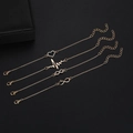 4-teiliges goldenes Armband-Set mit hohlem Herz, EKG-Welle und Infinity-Anhängern mit Strass - 4-teiliges Set / Gold