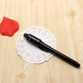 Invisible ink pen in sleek black finish with built-in UV light and stylus function - Black
