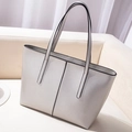 Large pearl grey faux leather tote bag with metallic texture and slender shoulder straps - Silver