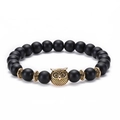 Detail view of 8mm matte black beads with a golden owl charm and vintage spacers - Owl - Antique Gold