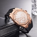 Detail of rose gold men's chronograph watch with black rubber strap on leather box - Rose Gold Case Silver White Dial(3)