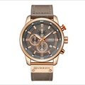 Detalle macro del reloj cronógrafo Curren para hombre con caja de oro rosa y esfera gris - Caja Dorada Esfera Gris