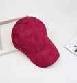 Solid deep pink faux suede baseball cap for men and women on a minimalist desk - Adjustable / Suede Wine Red
