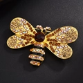 Elegant gold and black honey bee brooch with colorful rhinestones on a black background - Yellow Bee