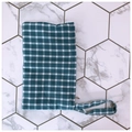 Detail of green gingham fabric pouch with neat stitching and convenient wristlet strap - Blue With White Grid