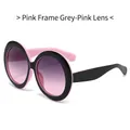 Occhiali da sole rotondi oversize con montatura rosa e nera e lenti sfumate grigio-rosa - Montatura Rosa Lenti Rosa Grigio