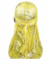 Macro shot of yellow silky durag featuring silver rose print and back knot detail - One Size / Gold