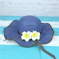 Dark blue wide brim straw hat with floral accent and wavy edges for beach sun protection - M (56-58cm) / Navy-Bound Edge Plumeria