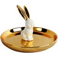 Detail of a white ceramic rabbit jewelry tray with golden ears and reflective gold finish - Gold Ear Rabbit Stand