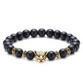 Detailed macro view of 8mm matte black beads and a golden leopard head charm on the bracelet - Leopard Head Antique Gold