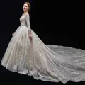 Robe de mariée ivoire à manches longues avec broderie de dentelle et paillettes - US 26W / Manches Longues Avec Traîne