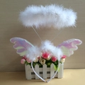 Detail of white feather halo headband with iridescent wings for festive costume parties - White Angel With Wings