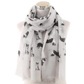 Light gray long scarf with cute dog prints and tassel trim on a studio mannequin - Gray