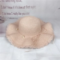 Pink wide brim straw sun hat with wavy edges and pearl bow detail for women's beach travel - M (56-58cm) / Light Pink