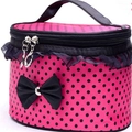 Pink polka dot makeup bag with black lace trim and bow on a white background - Round Dots Rose Red Black