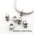 Detailed macro view of 6x10mm silver alloy bail beads with 4.5mm hole for jewelry making - 8914-Silver Pandora Style