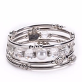 Bohemian silver wrap bracelet featuring pearls, tree of life charms and crystals - Clear Quartz