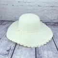 Creamy white woven straw sun hat with large brim and delicate bow accent on wood background - M (56-58cm) / Creamy White