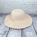 Women summer straw hat with wide wavy brim and bow decoration for sun protection - M (56-58cm) / Light Pink