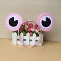 Close-up of pink frog eye headband made of felt, perfect for children costume parties - Pink Frog
