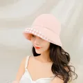 Detail view of pink sun hat with checkered brim trim and sweet Korean style design - Pink / M (56-58cm)