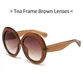 Lunettes de soleil rondes oversize avec monture ambre transparent et verres dégradés - Monture Thé Verres Dégradé Thé