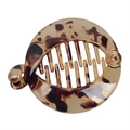 Close-up of a tortoiseshell resin banana hair clip with leopard pattern and interlocking teeth - Light Coffee Leopard